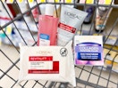 loreal wipes, moisturizer, and other skincare in a cart