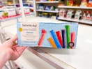 hand holding up a favorite day freeze pops 80-count box