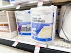 mattress toppers sitting on a target shelf