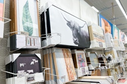 wall art and canvas sitting on a target shelf