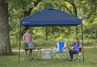 dark blue canopy tent over a couple of people