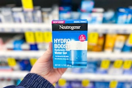 person holding a neutrogena hydro boost moisturizer