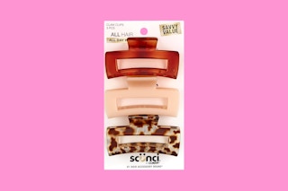 scunci hair clips on a pink background