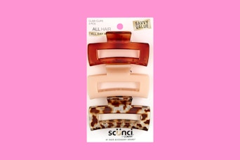 scunci hair clips on a pink background