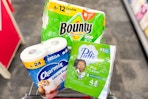 charmin, bounty, and puffs paper products in a cart