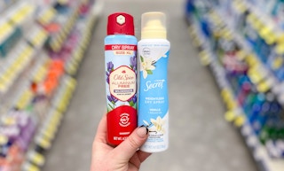 hand holding old spice and secret dry spray deodorant