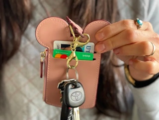 someone holding up their mouse lanyard