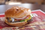Dave's Single Burger unwrapped at a Wendy's fast food restaurant