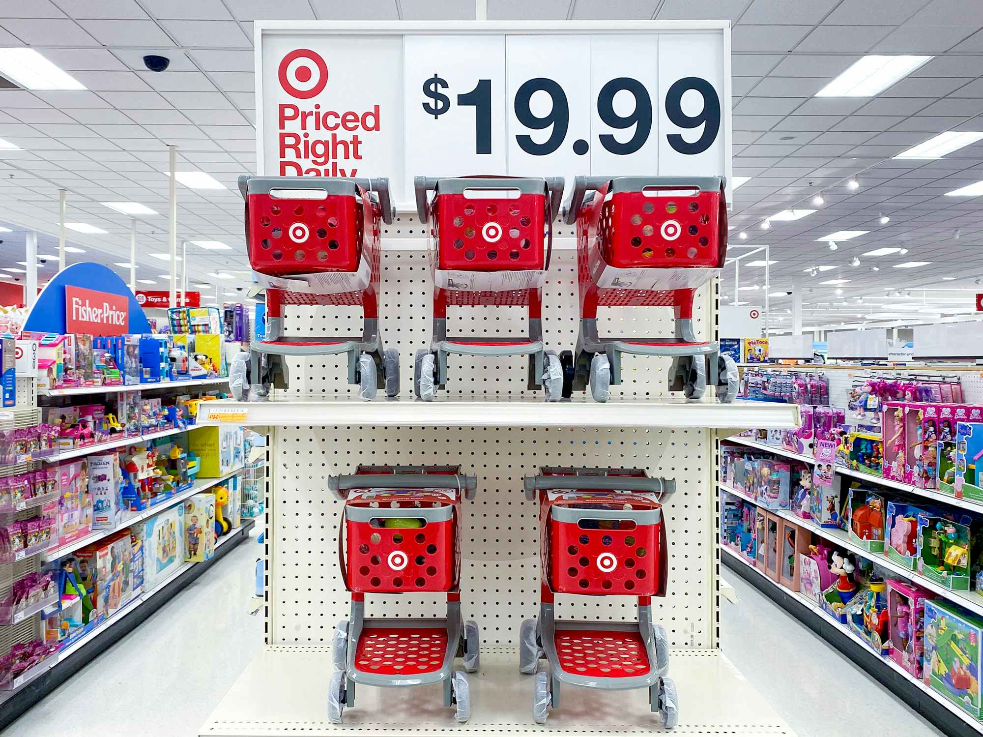 target toy shopping carts on store shelves with $19.99 price sign