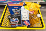 dollar general groceries in yellow shopping basket