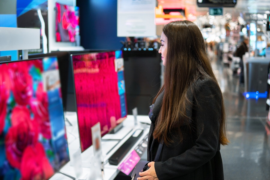 best-time-buy-tv-woman-shopping-television-136041522