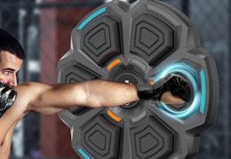 a person using a music boxing machine