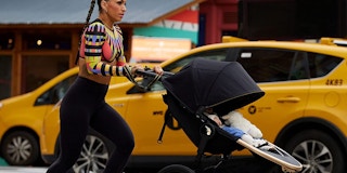 Robin Arzon jogging with a Baby Jogger stroller