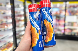 hand holding pillsbury crescents