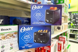 2 oster toasters sitting on a target shelf