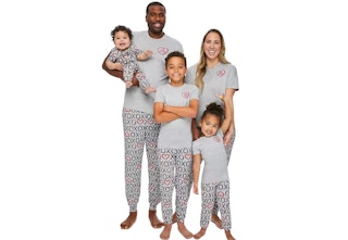 family in matching valentines pajamas
