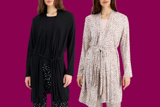 two women wearing a robe 