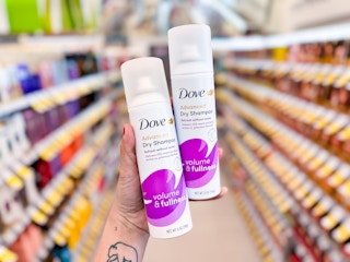 hand holding two dry shampoo