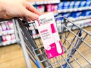 hand holding a first response box on Walmart cart