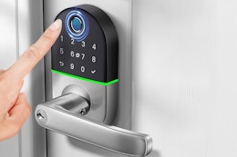 Person using the NICE DIGI Keyless Entry Fingerprint Lock.