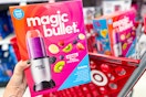 hand holding a magic bullet blender set in front of a target shelf