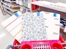 3 target bath rugs sitting in a cart