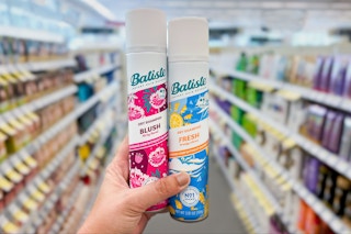 hand holding two batiste dry shampoos