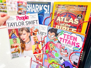 magazine in hand in store display