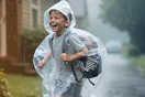 a kid wearing a poncho