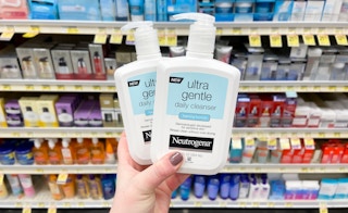 hand holding neutrogena ultra gentle facial cleanser