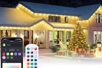 lemonlovely Smart 150FT Permanent Outdoor Lights on a house in the winter snow.