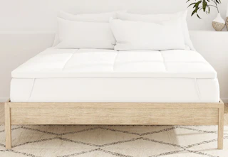 Linens & Hutch mattress topper on a bed. 