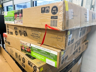 boxes of Walmart patio furniture on clearance
