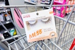 package of kiss eyelashes in a cart