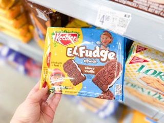 hand holding el fudge cookies in walmart cookie aisle