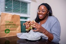      Person holiding a publix sandwich