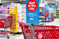 photo of a target shopping cart near a deal of the day sign