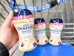 three containers of Downy Blend scent boosters