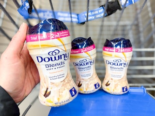 three containers of Downy Blend scent boosters