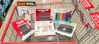 variety of school supplies in a cart at costco
