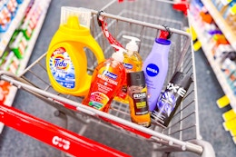 tide simply, softsoap hand soap, axe body spray, and nivea lotion in a cart