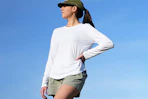 woman wearing white sun protection shirt 