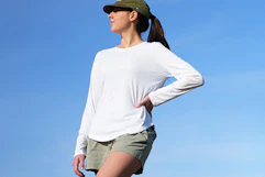 woman wearing white sun protection shirt 