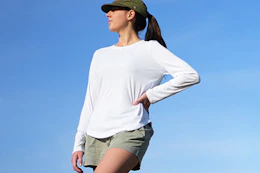 woman wearing white sun protection shirt