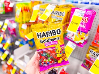 hand holding haribo wild berry bears in cvs