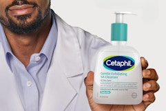 someone holding Cetaphil Gentle SA Cleanser