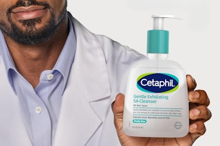 someone holding Cetaphil Gentle SA Cleanser