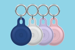 four AirTag Keychain Holders on a blue background