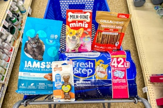 iams cat food, nylabone dog toy, fresh step cat litter, milk bone treats, and dog chews in a cart
