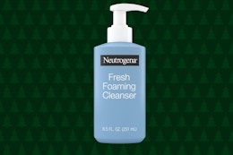 a blue bottle of facial cleanser